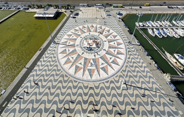 The large compass in the wave pavement in front of the Monumento a Los Descubrimientos, Lisbon,
