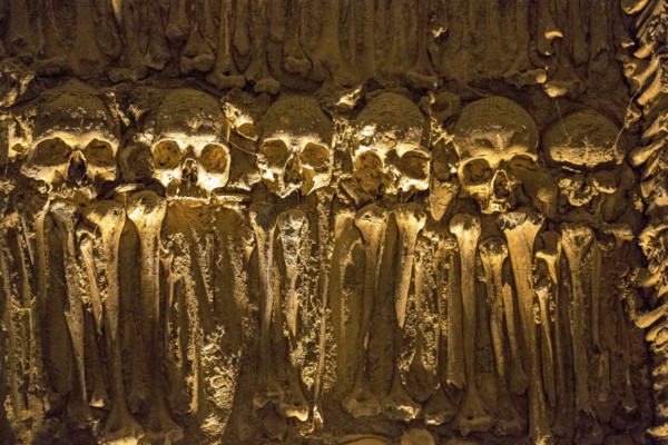 Piled bones in the ossuary, Capela dos ossos parede, chapel of bones, bone chapel, ossuary in