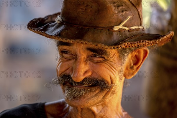 Sugar cane farmer in Valle de los Ingenios, portrait with hat, Trinidad, Cuba, Sancti Spíritus,