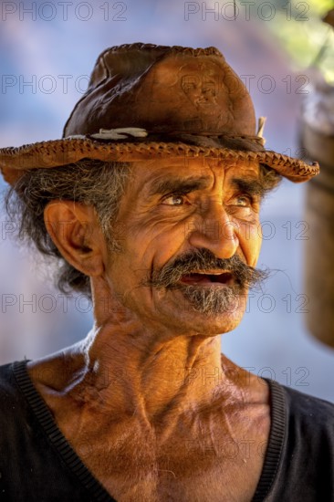 Sugar cane farmer in Valle de los Ingenios, portrait with hat, Trinidad, Cuba, Sancti Spíritus,
