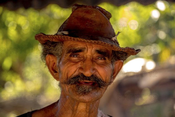 Sugar cane farmer in Valle de los Ingenios, portrait with hat, Trinidad, Cuba, Sancti Spíritus,