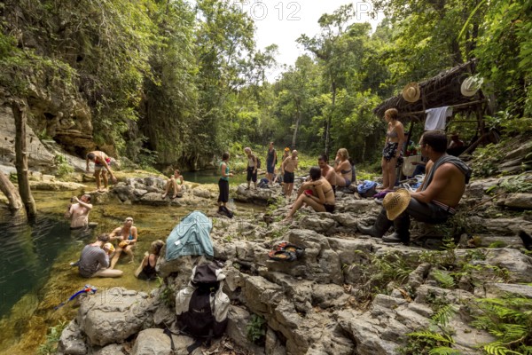 Small bathing lake in the Valle de los Ingenios with tourists, Trinidad, Cuba, Sancti Spíritus,
