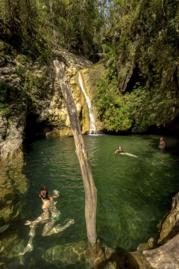 Small bathing lake in the Valle de los Ingenios with tourists, Trinidad, Cuba, Sancti Spíritus,