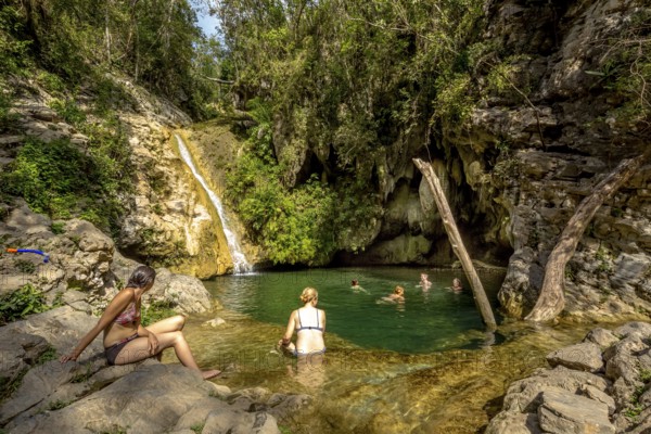 Small bathing lake in the Valle de los Ingenios with tourists, Trinidad, Cuba, Sancti Spíritus,