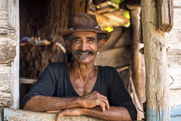 Sugar cane farmer in Valle de los Ingenios, portrait with hat, Trinidad, Cuba, Sancti Spíritus,
