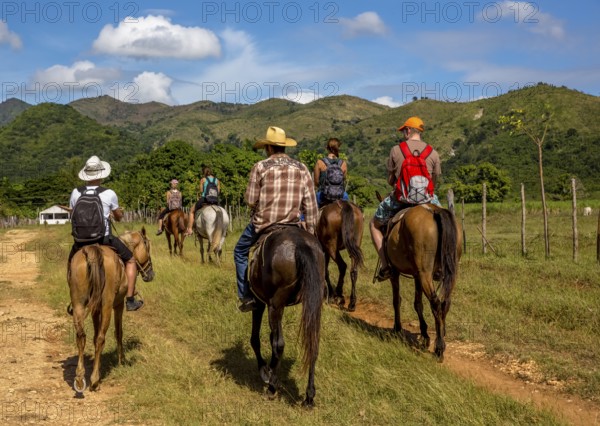 Tourists on horseback in the Valle de los Ingenios, Trinidad, Cuba, Sancti Spíritus, Cuba, Sancti