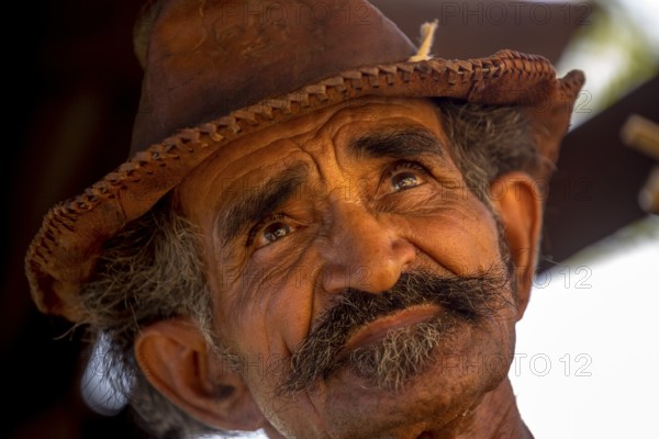 Sugar cane farmer in Valle de los Ingenios, portrait with hat, Trinidad, Cuba, Sancti Spíritus,