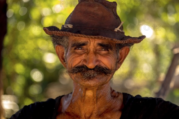 Sugar cane farmer in Valle de los Ingenios, portrait with hat, Trinidad, Cuba, Sancti Spíritus,