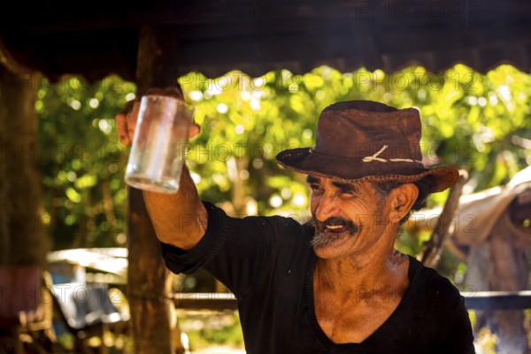 Sugar cane farmer in Valle de los Ingenios, portrait with hat, Trinidad, Cuba, Sancti Spíritus,