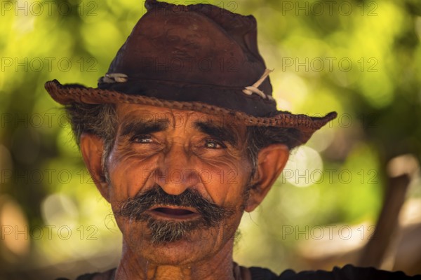 Sugar cane farmer in Valle de los Ingenios, portrait with hat, Trinidad, Cuba, Sancti Spíritus,