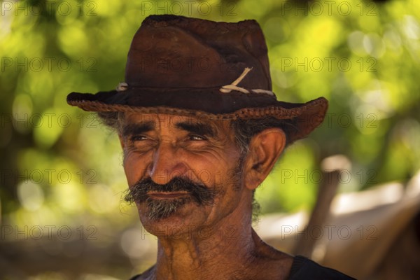 Sugar cane farmer in Valle de los Ingenios, portrait with hat, Trinidad, Cuba, Sancti Spíritus,