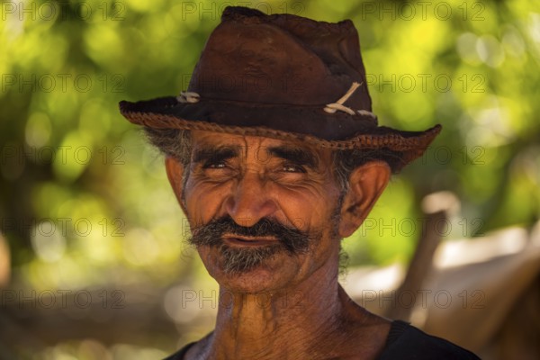 Sugar cane farmer in Valle de los Ingenios, portrait with hat, Trinidad, Cuba, Sancti Spíritus,