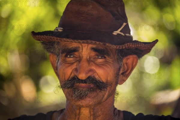 Sugar cane farmer in Valle de los Ingenios, portrait with hat, Trinidad, Cuba, Sancti Spíritus,