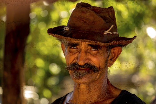 Sugar cane farmer in Valle de los Ingenios, portrait with hat, Trinidad, Cuba, Sancti Spíritus,