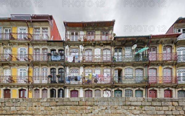 Colourful houses on the banks of the Douro in the Ribeira district, doors, Oporto, Porto district,
