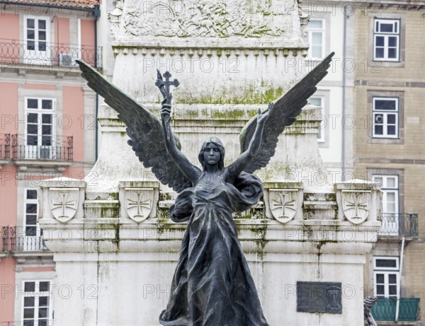 Angel figure in front of the stock exchange palace Palácio da Bolsa, Oporto, Porto district,