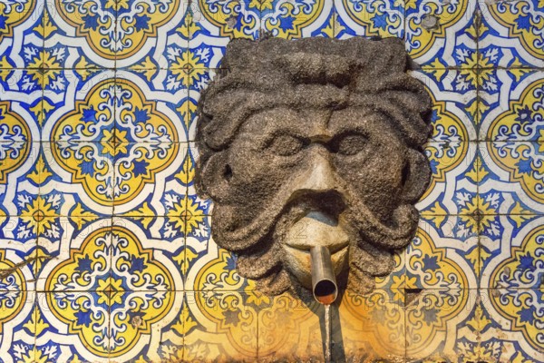 Fountain in the Sandemann cellar with historical tiles, gargoyles, azulejos, wine cellar of the