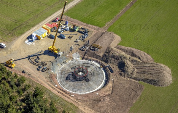 Aerial view, construction site with construction crane for wind turbine wind power plant at