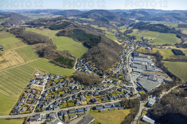 Aerial view, commercial area Röhre and residential area local view Am Bühl, hilly landscape forest