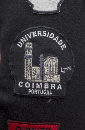Stickers with different meanings on the capes of the students of Coimbra, University of Coimbra,