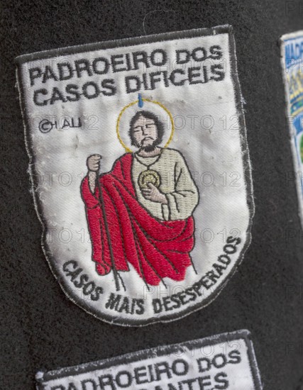 Stickers with different meanings on the capes of the students of Coimbra, University of Coimbra,