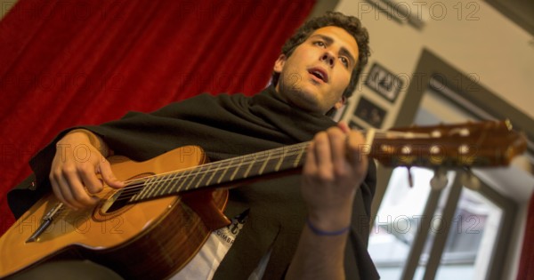 Fado singer in a cultural centre, Coimbra, Coimbra district, Portugal, Europe, aerial view,
