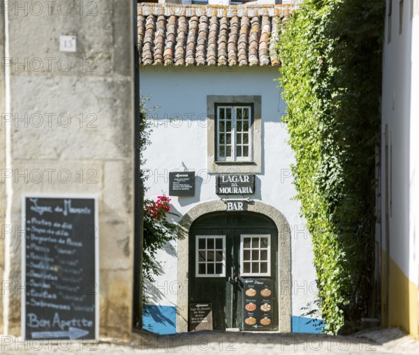 Within the castle walls lie Malrean alleys, picturesque small town of Obidos, Ãbidos, Leiria