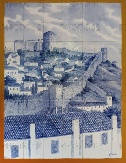 Azelejos, painted tiles with the city motif of the city wall and Obidos Castle, picturesque small