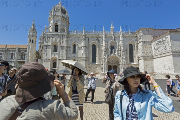 Japanese tourists in front of the Mosteiro dos Jerónimos, UNESCO World Heritage Site, Lisbon,