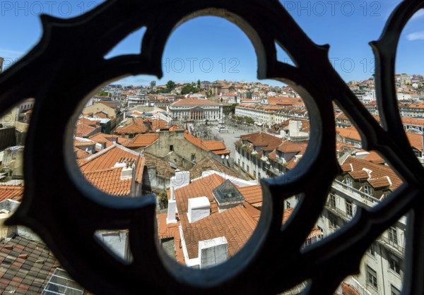 View through wrought iron grating from Portugal's most famous lift Elevador do Município or