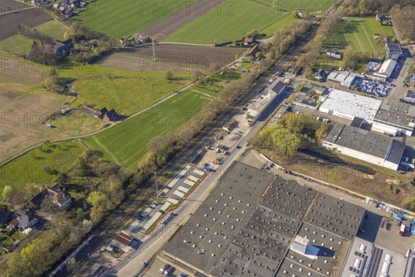 Aerial view, industrial area with construction site at the railway station at Bahnhofstraße, Bork,