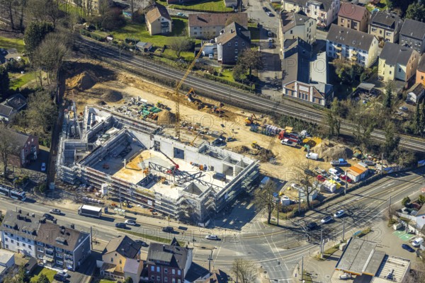Aerial view, construction site with new building shopping centre Rewe supermarket,
