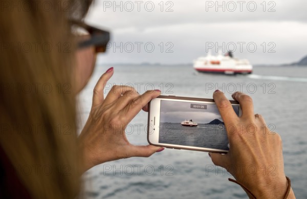 Ship MS Kong Harald, mobile phone photography, ship filming, Bolga, Nordland, Norway, Scandinavia,