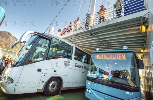 Coaches on a ferry, Eidsdal, Møre og Romsdal, Norway, Scandinavia, Europe, adventure travel,