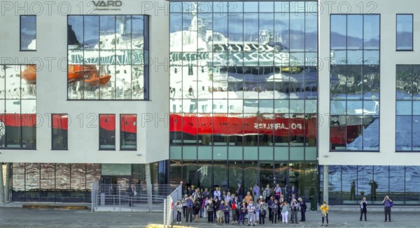 Cruise ship MS Polarlys, reflection, tourists at the quay, Ã...lesund, Møre og Romsdal, Norway,