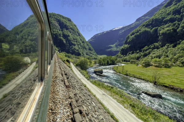 Travelling by Flam Railway, iron railway journey, view from Flåmsbana, Ryavegen, mountains,
