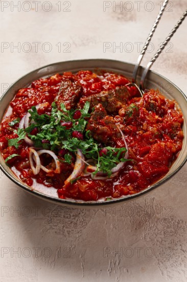 Chashushuli, a traditional Georgian dish, spicy, stewed meat with tomatoes and spices, homemade, no
