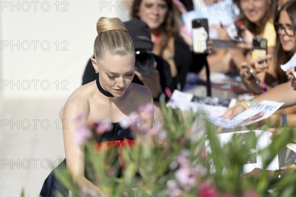 Venice, Italy - 1 September 2025: Amanda Seyfried signing autographs during the Red Carpet of - The