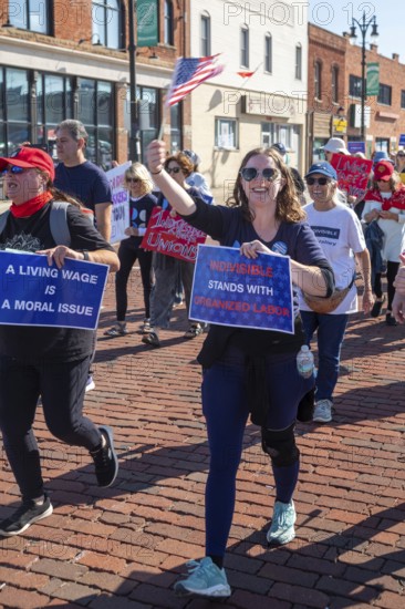 Detroit, Michigan USA - 1 September 2025 - Members of Indivisible march in Detroit's Labor Day