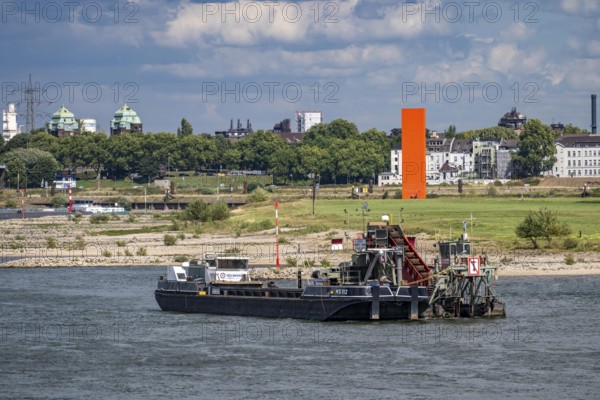 Bucket chain dredger at work on the Rhine near Duisburg, between the Neuenkamper Rhine Bridge and
