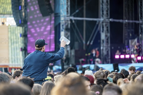 Visitors celebrate during Nelly Furtado's performance at the Superbloom Festival, Day 1 at the