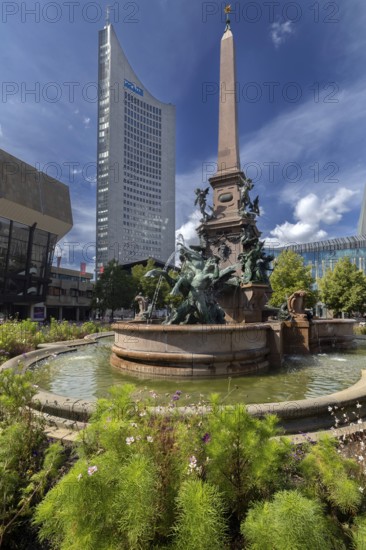 City skyscraper at Augustusplatz with Mende fountain, Leipzig, Saxony, Germany, 26.08.2025 <