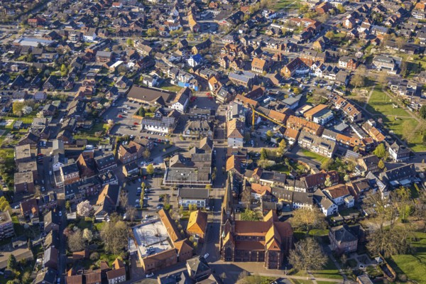 Aerial view, city centre view with town hall and new building site with facade cladding, market