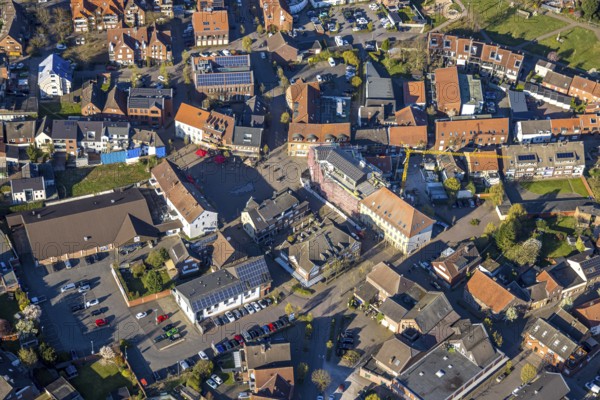 Aerial view, city centre view with town hall and new building site with facade cladding, market