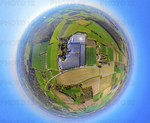 Aerial view, palm hero and gardener Gregg garden centre greenhouse, surrounded by meadows and