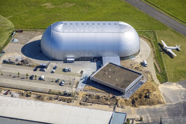 Aerial view, Airport Essen/Mülheim, construction site next to the airship hangar, parked