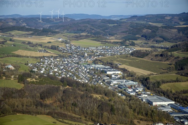Aerial view, Elspe commercial area with residential area and village view with catholic church St.