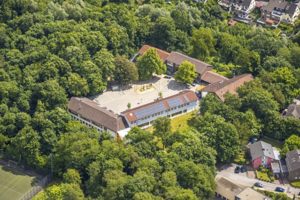 Aerial view, St. Suitbertus Municipal Catholic Primary School with schoolyard, roof with solar