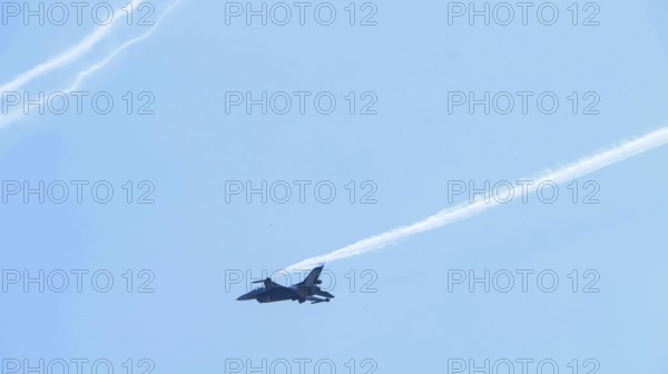 Turkish Air Force helicopters and fighter jets perform aerobatic maneuvers during Teknofest