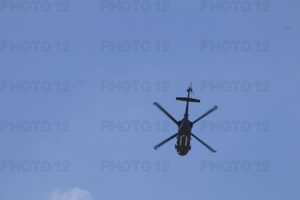 Turkish Air Force helicopters and fighter jets perform aerobatic maneuvers during Teknofest